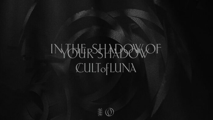 Cult Of Luna: Neue Single online, kündigen neues Album an Dark abstract background with pale text reading 'IN THE SHADOW OF YOUR SHADOW OF CULT OF LUNA' (album/cover art).