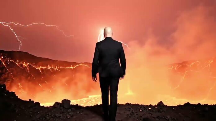 Raunchy veröffentlichen dritte Single „Darkest Self“ A man in a black suit walks toward a lava-filled volcanic crater as orange lava lights the sky and sparks fly.