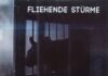 Fliehende Stürme kündigen „EinsEinsEins“ als Vorbote zum neuen Album an Dark poster featuring a shadowy animal behind bars, with white text at the top reading 'FLIEHENDE STÜRME' and red text at the bottom.
